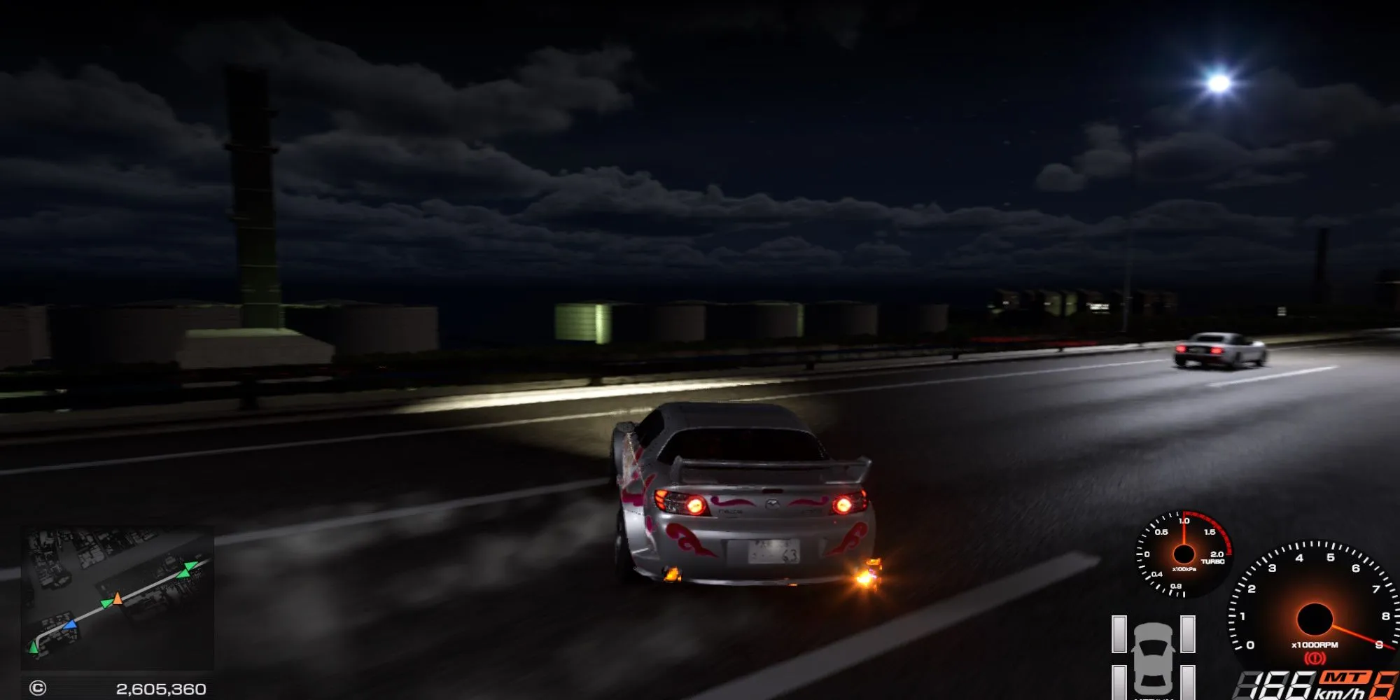 Một chiếc xe thực hiện pha drift đẹp mắt trên đường cao tốc trong game Tokyo Xtreme Racer