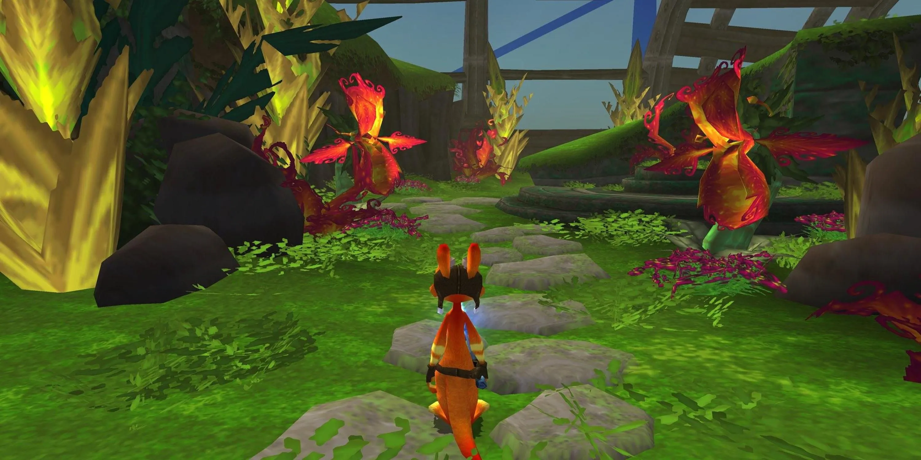 Daxter đứng trên con đường đá giữa những thực vật xanh tươi, minh họa môi trường game chi tiết của Daxter trên PSP