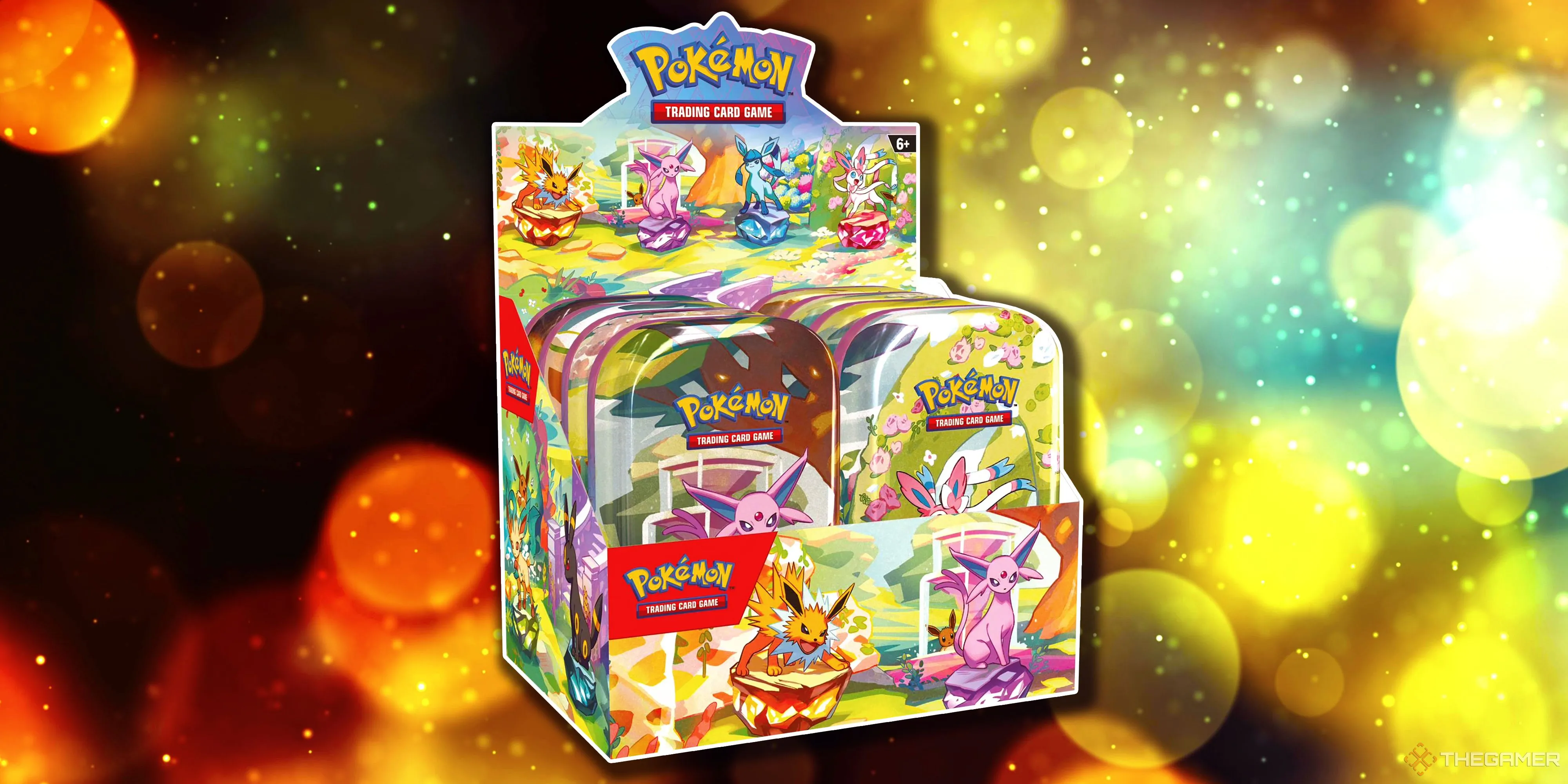 Mini Tin Display Prismatic Evolutions của Pokémon TCG, hiển thị tám hộp thiếc nhỏ với thiết kế độc đáo của Eevee và các dạng tiến hóa Eeveelution.