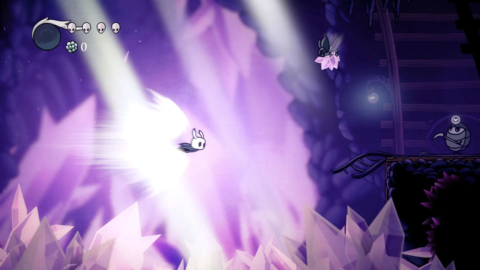 Kỵ Sĩ rỗng thực hiện pha dash né đòn trong Hollow Knight, một tựa Metroidvania cuốn hút