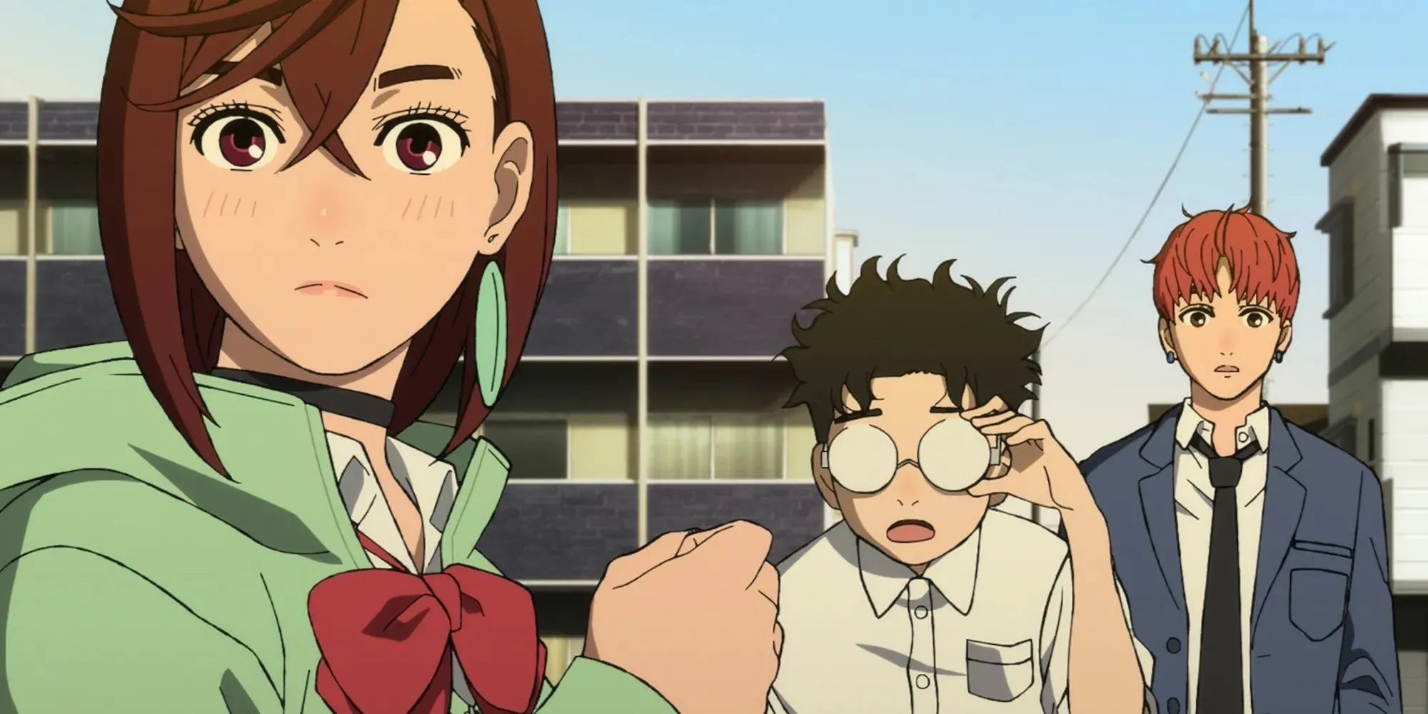 Momo Ayase và Okarun - hai nhân vật chính của Dandadan đứng cạnh nhau